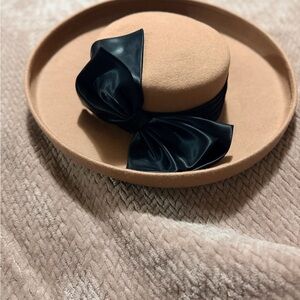 Elegant Tan Hat with Black Bow